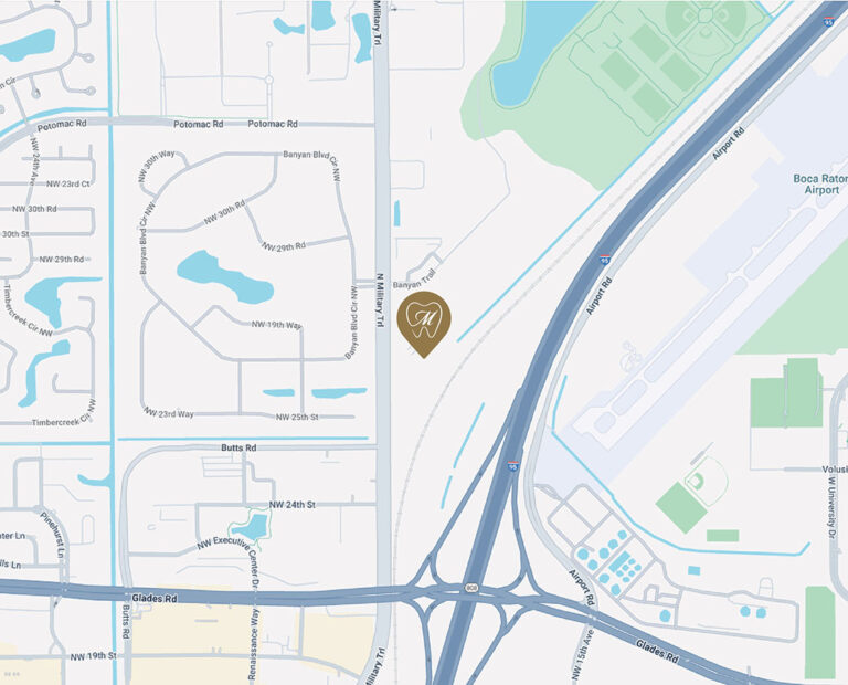 Map of Boca Raton, Florida, centered near I-95 and Glades Road, showing labeled streets and landmarks. A brown “GN” marker appears near Banyan Blvd and NW 1st Ave, with Boca Raton Airport visible to the east.
