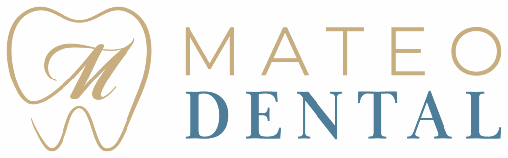 Logo for Mateo Dental featuring a gold tooth outline with a cursive “M” inside. To the right, “MATEO” appears in gold uppercase letters above “DENTAL” in blue, all on a transparent background.